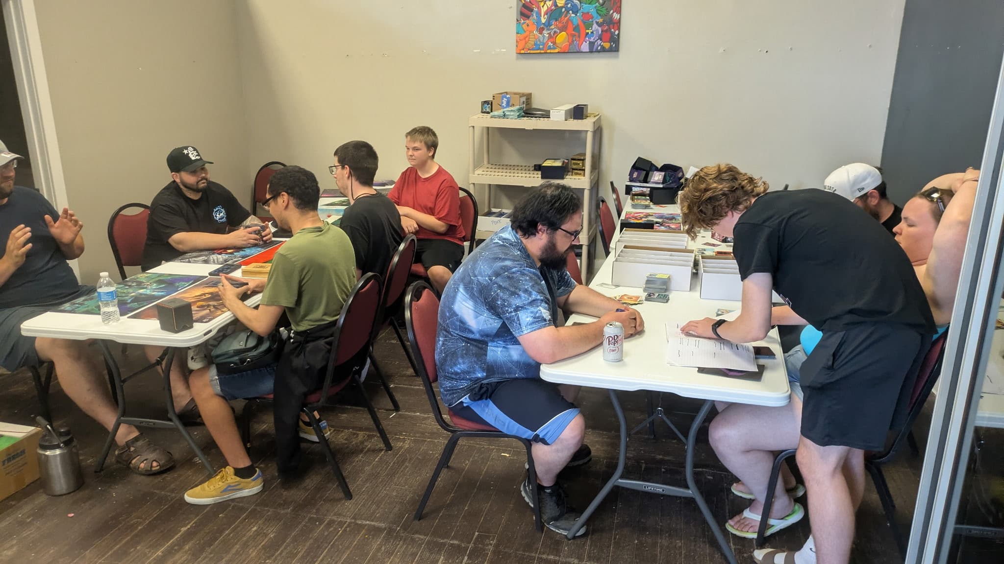 Local players enjoying casual Commander pods during Friday Commander Night at The Wolf Den in Montgomery, Minnesota