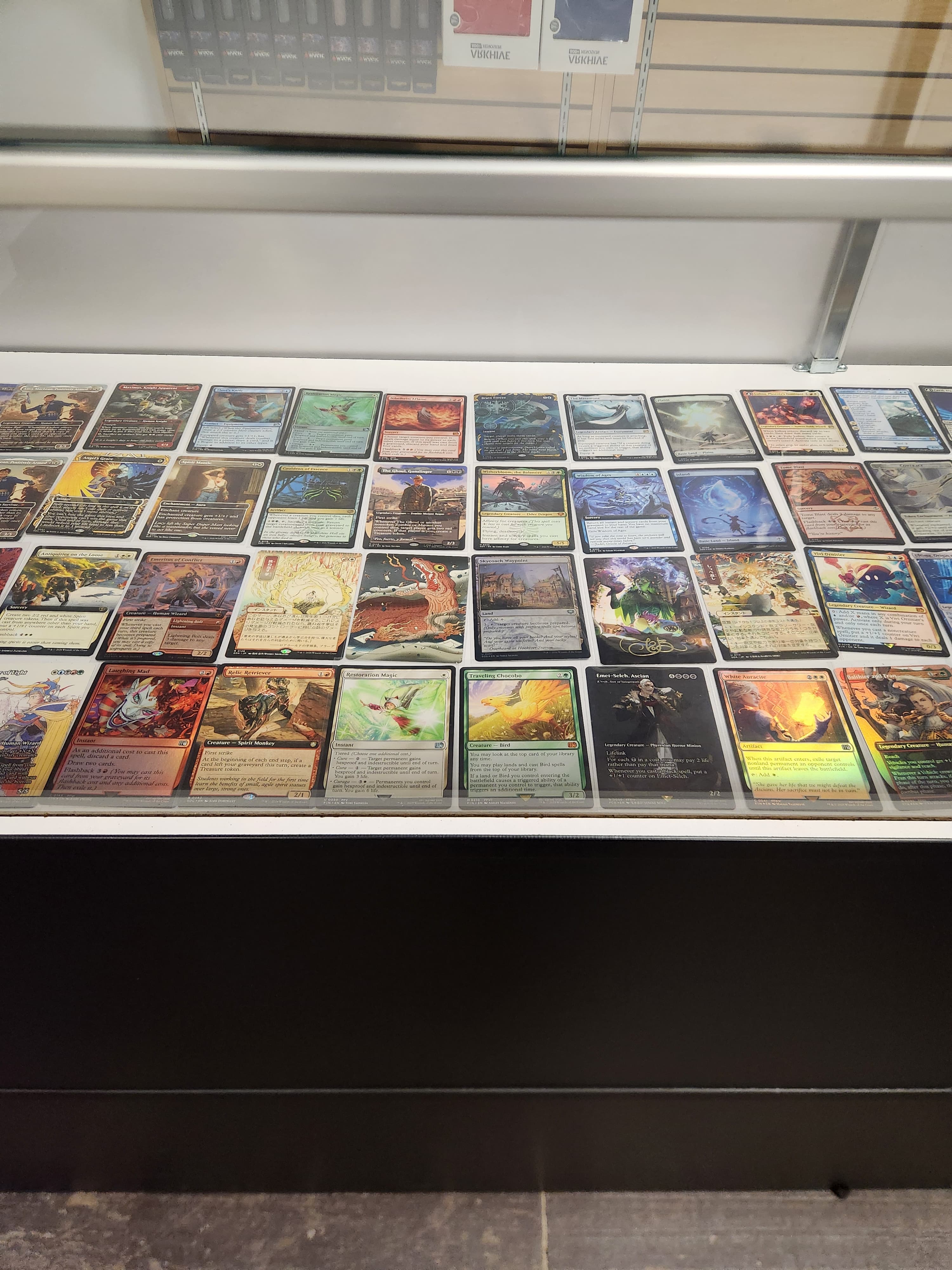 Magic and trading card singles display case used for local buylist and trade-ins at The Wolf Den